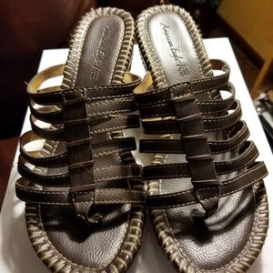 Brown leather look wedges.